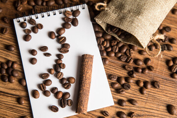 Notebook and coffee beans