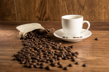 Cup of coffee and coffee beans