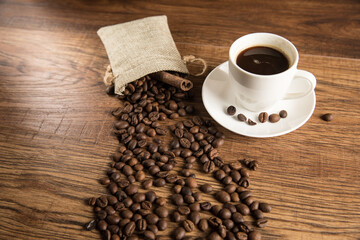 Cup of coffee and coffee beans