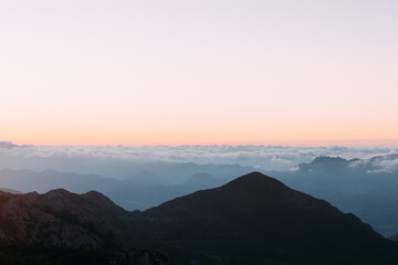 mountain scenery at sunset with sea of clouds