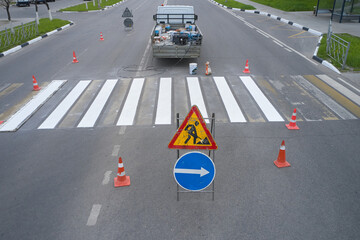 Renovation the marking of a pedestrian crossing in the city
