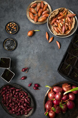 Many different varieties of onions for planting in the ground, copy space