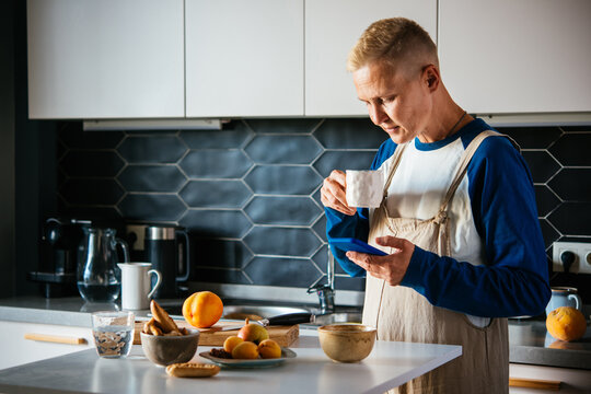 Gender fluid woman in Kitchen