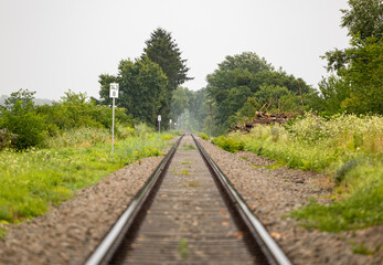 Fototapeta na wymiar austrian railway perfectly straight trees