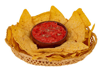 Delicious nachos with red sauce. Stock photo of tortilla chips inside a basket. Corn chips isolated stock photo. Snack. Salsa. Tomato. Tasty. Dip. - obrazy, fototapety, plakaty
