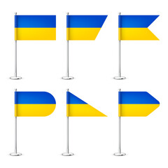 Realistic various Ukrainian table flags on a chrome steel pole. Souvenir from Ukraine. Desk flag made of paper or fabric, shiny metal stand. Mockup for promotion and advertising. Vector illustration