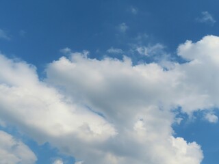 Heart shape cloud in blue sky background, natural cloudscape