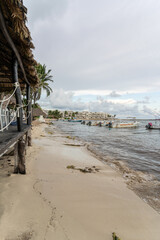 Fishing boats on the white coast of the Caribbean Sea in Playa Del Carmen.