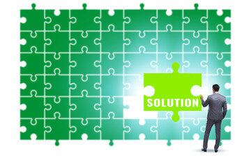 Business solution concept with jigsaw puzzle pieces