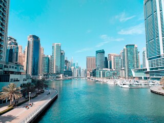Fototapeta na wymiar Dubai marina canal view with beautiful view for buildings and promenade 