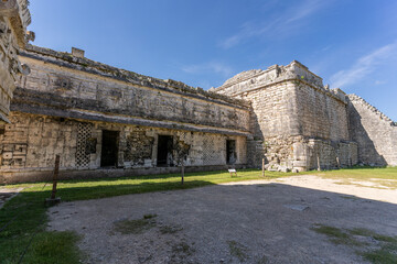 The ruins of a beautiful pyramid in the archaeological zone of Chichen Itza in Mexico.