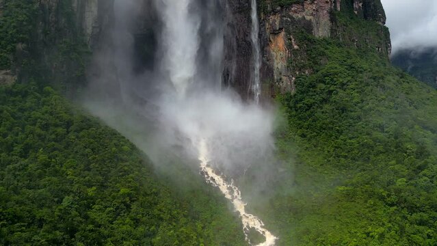 Aerial view of foot of Angel Falls waterfall. A huge flow of water falls from the mountain. The tallest uninterrupted waterfall in the world. Canaima National Park, Venezuela