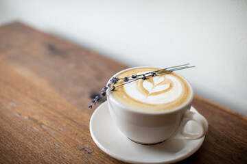 cup of coffee latte heart art lavender
