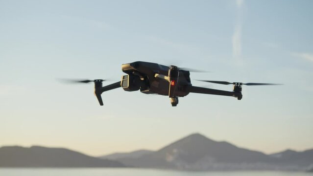 Montenegro, january 2023: drone mavic 3 take off, sea and mountains on background. filmmaker traveling with drone