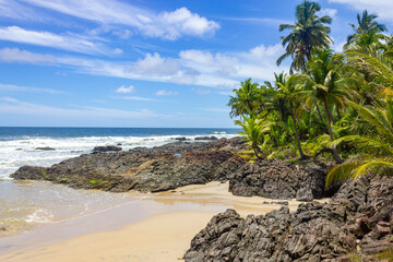 Sand, waves and rocks at Havaizinho beach