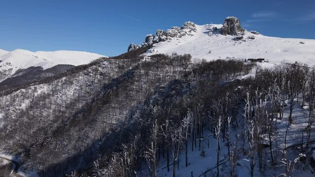 Old Mountain Balkan Stara Planina Babin Zub tourist resort in winter day covered with snow