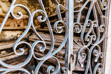 Buenos Aires, Argentina - December 21, 2022: Details of wrought iron fencing in La Recoleta Cemetery in Buenos Aires Argentina.
