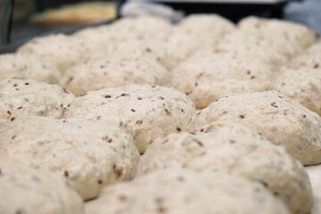 preparations of grain bread are on the table. baker at work. The baker shapes the bread. Hands on the close-up foruyut bread	