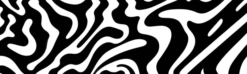 Black and white fabric pattern has wild design, like zebra or tiger, adding an interesting texture to the background.