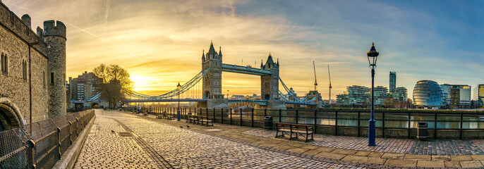 Tower of London wharf and Tower Bridge at sunrise 