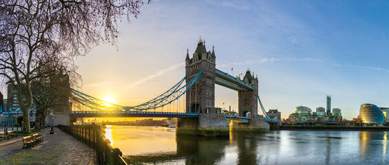 Side view of Tower Bridge at sunrise in London. England