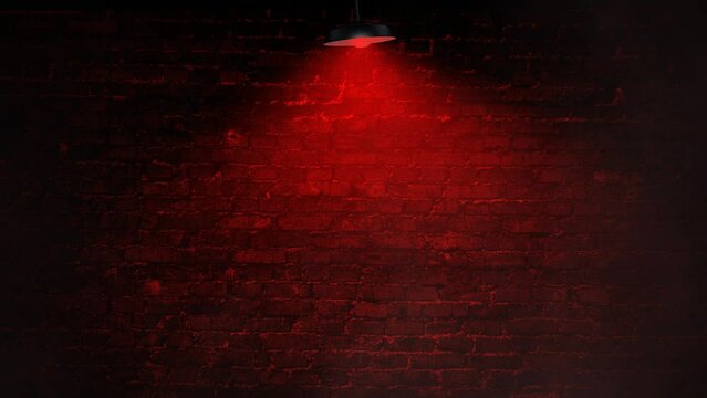 Red Light Brick Wall with Fog Background 4K Loop features a brick wall with a red lamp hanging down and swinging slightly with fog rolling by in a loop.