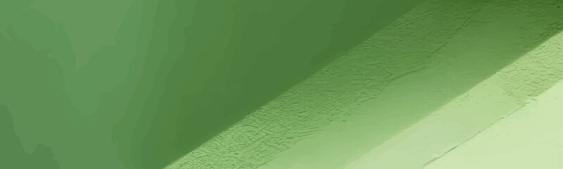 Rough green paint texture on solid stucco building creates colorful and art inspired wallpaper background.