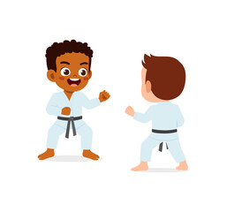 cute little kid training karate with friend together © Colorfuel Studio