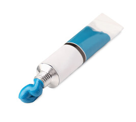 Tube with blue oil paint on white background