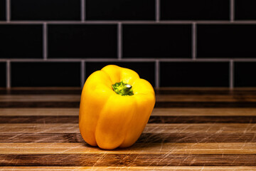 Yellow Pepper on Butcher Block 1