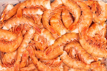 Frozen shrimp tails of a delicious orange color
