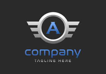 A letter logo inside a winged silver ring.