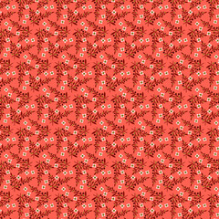 Spring floral fabric pattern with simple white flowers and dark red berry twigs on a coral red background