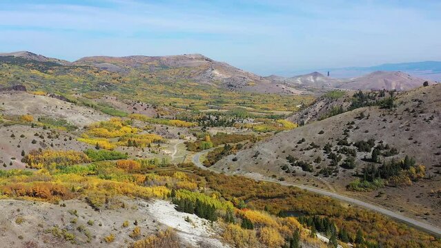 Flying over Anaconda, MT. Enjoy the  amazing fall colors in the trees.