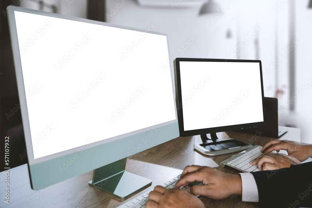 Poster a businessman is working on a mock-up. using a laptop with a blank copy space screen for your advert