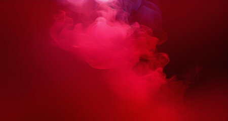 Red smoke on dark for wallpapers and backgrounds