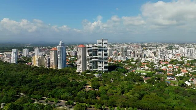 Les Elysees and Les Champs towers buildings skyscrapers with cityscape, Santo Domingo in Dominican Republic. Aerial drone panoramic view