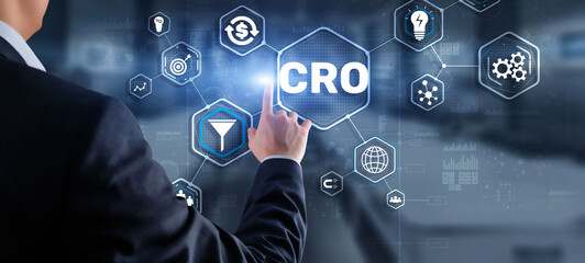 Conversion Rate Optimization. CRO Technology Finance concept Businessman pressing on a virtual screen