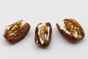 Dry dates, mascarpone cheese and walnuts. Italian homemade dessert.