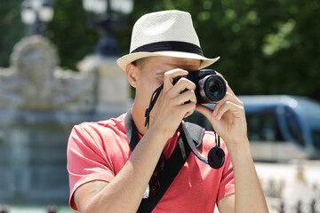 portrait of a man taking a photo