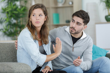 woman ignoring boyfriend during argument