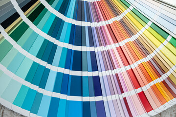 catalog in bright color palette close-up on desk