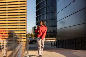 young african american student woman in the city