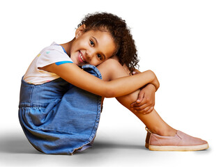 A portrait mixed race girl  child smiling and looking carefree in casual clothes isolated on a png background.