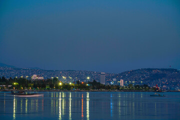 city skyline at night in izmir