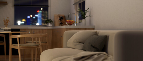 Modern apartment living room interior design with cozy couch, dining table and cooking space