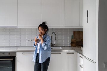 Unhealthy Asian woman takes pill painkillers, antibiotics or antiviral med prescribed by physician...