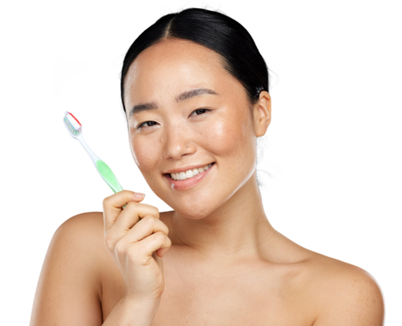 A beautful young asian girl using a dental care product for oral hygiene isolated on a png background. A modern korean girl using a medically approved tooth paste and tooth brush.