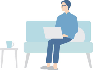 ソファでパソコン作業をしているビジネスウーマン