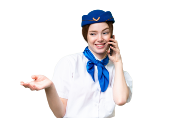 Airplane stewardess over isolated chroma key background keeping a conversation with the mobile phone with someone